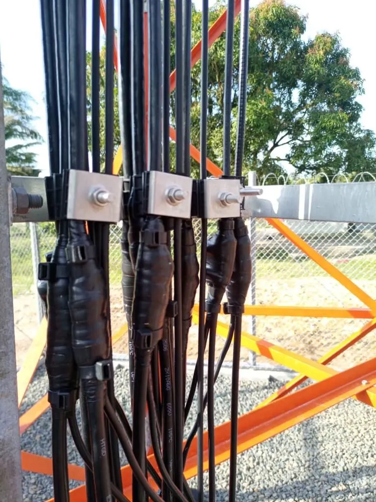 Sector antennas and remote radio units mounted on a tower headframe