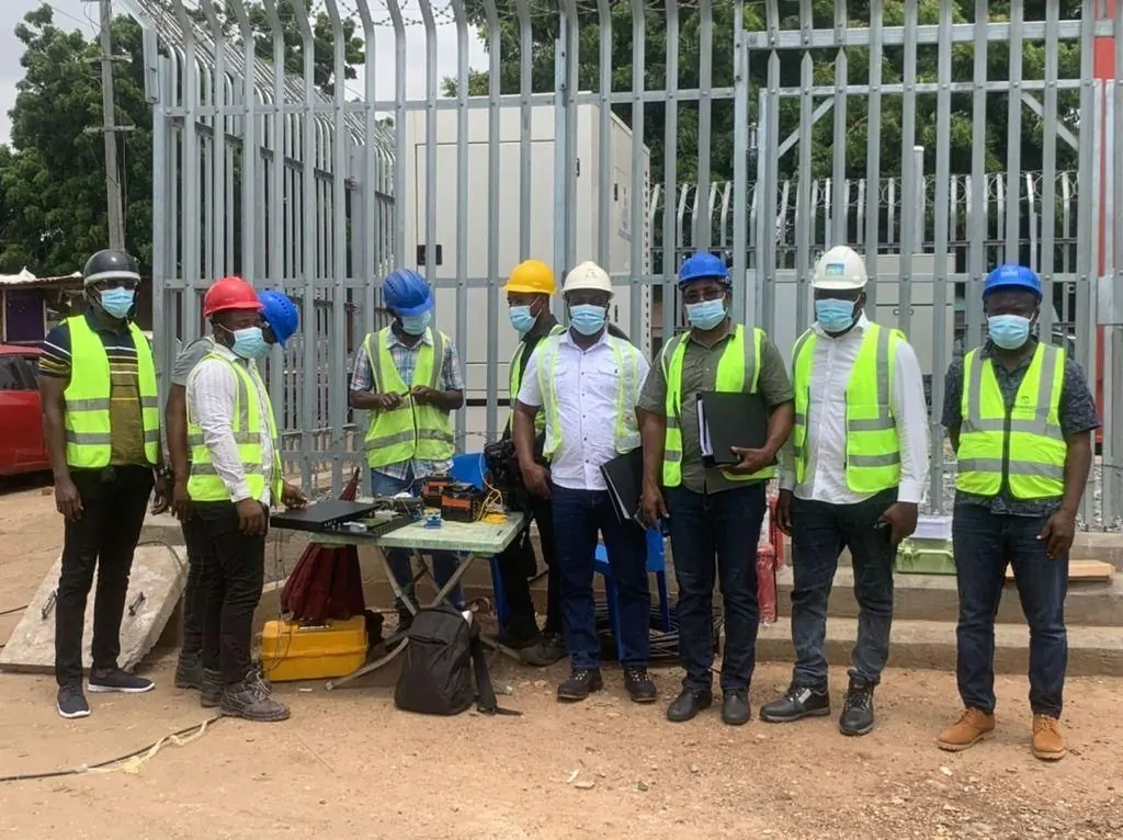 The full SPA project crew lined up in PPE at a secured telecom site