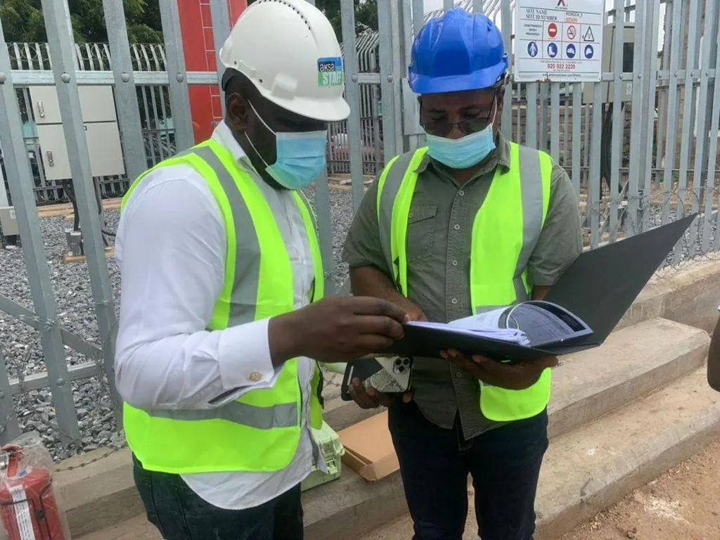 Management reviewing site documentation together