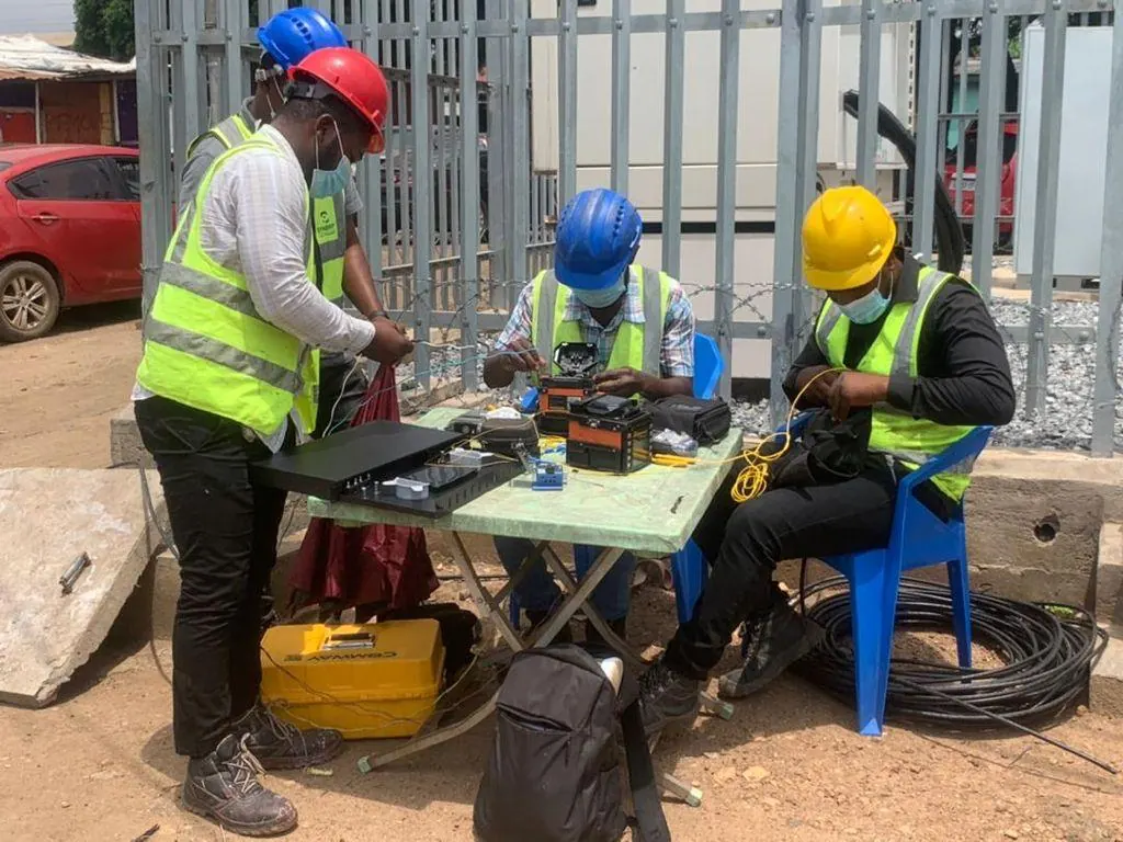 Technician demonstrating test equipment to the team