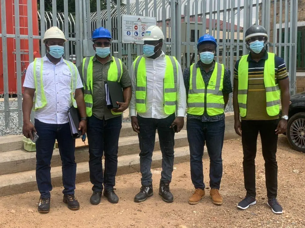 Group photograph of attending staff in full PPE